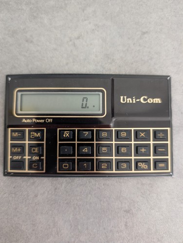 Uni com pocket calculator - pocket,
